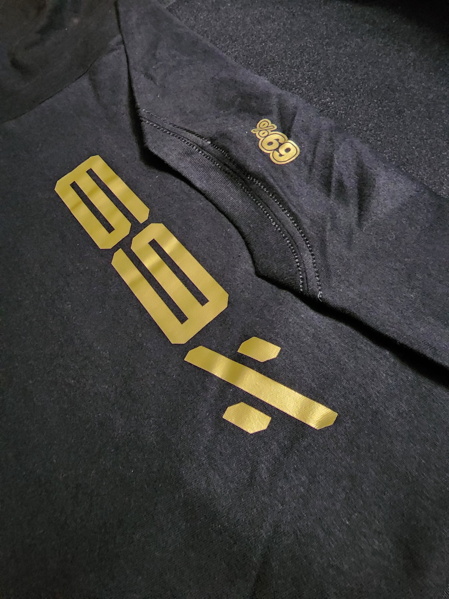Genesis Parody, Black & Gold Tee